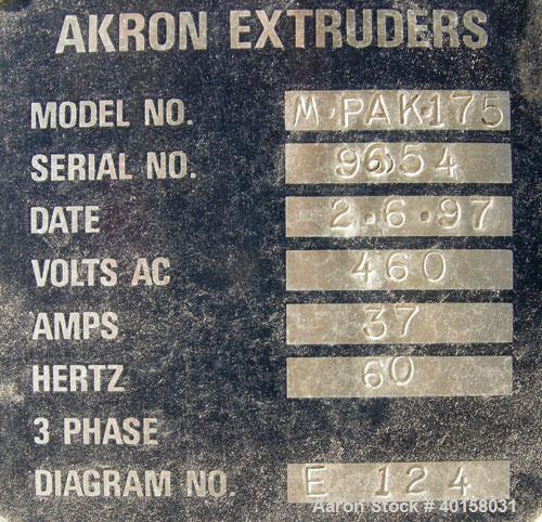 Used Akron 1 3/4" single screw extruder, model M-PAK175, approximately 24 to 1 L/D ratio. Electrically heated, air cooled 3 zone non-vented barrel. Water cooled feed throat with a lump breaker, no ho...