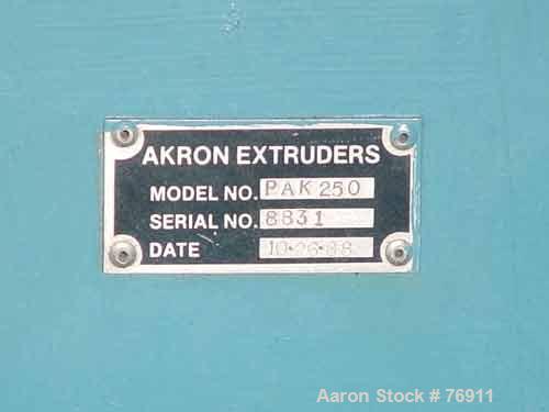 Used Akron 2-1/2" Single Screw Extruder, Model PAK2500. 24:1 L/D ratio. Electrically heated, air cooled barrel, water cooled feed throat (no hopper). Driven by a 40 hp DC motor thru a Koellmann gearb...