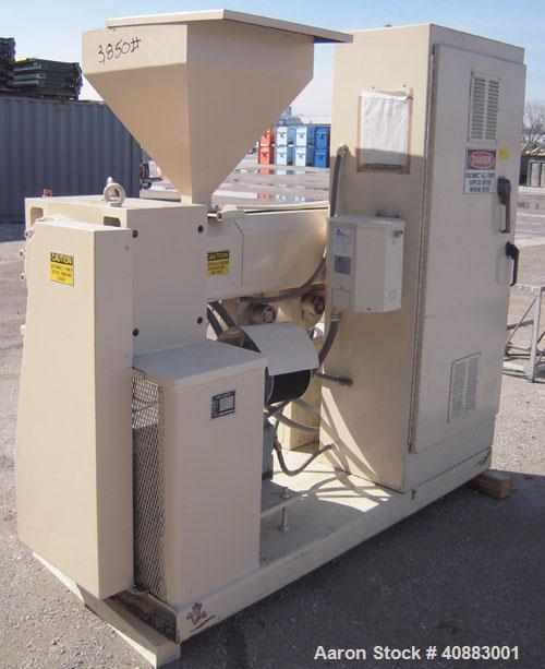 Used Akron 2 1/2" Single Screw Extruder, Model PAK250, approximately 24 to 1 L/D ratio. Electrically heated, air cooled 4 zone non-vented barrel. Water cooled feed throat, with hopper. Approximately ...