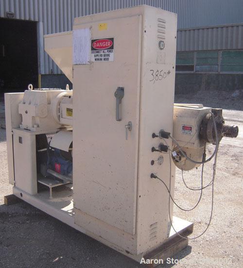 Used Akron 2 1/2" Single Screw Extruder, Model PAK250, approximately 24 to 1 L/D ratio. Electrically heated, air cooled 4 zone non-vented barrel. Water cooled feed throat, with hopper. Approximately ...