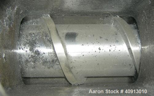 Used Akron 3 1/2" Single Screw Extruder, model PAK350, approximate 24:1 L/D ratio. Electrically heated, air cooled 5 zone non-vented barrel. Water cooled feed throat, no hopper. Driven by a 75 hp, 30...
