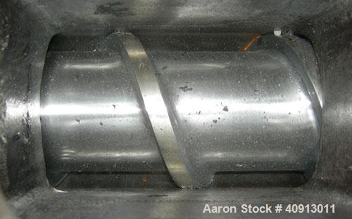 Used Akron 3 1/2" Single Screw Extruder, model PAK350. Approximate 24:1 L/D ratio. Electrically heated, air cooled 5 zone air non-vented barrel. Water cooled feed throat with magnet, no hopper. Drive...