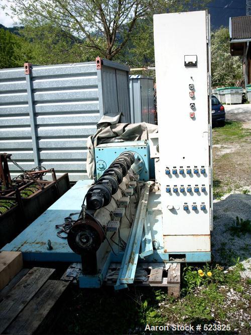 USED: Barmag model 9E4 extruder, 3.54" (90mm), type 9E4/27D. Maxscrew speed 125 rpm, driven by a 125 hp motor; heating and coolingcombination; 440 volts/60 hz/3 ph.