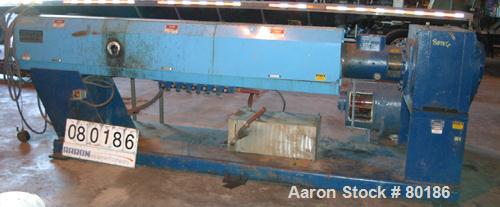 USED: Berlyn 4.5" single screw extruder, model 4.5" extruder. 30:1 L/D6 zone electrically heated, water cooled. 4-1/2" diameter watercooled feed throat. 5" diameter side vent, 94" from feed, 44" cent...