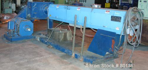 USED: Berlyn 4.5" single screw extruder, model 4.5" extruder. 30:1 L/D6 zone electrically heated, water cooled. 4-1/2" diameter watercooled feed throat. 5" diameter side vent, 94" from feed, 44" cent...