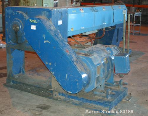 USED: Berlyn 4.5" single screw extruder, model 4.5" extruder. 30:1 L/D6 zone electrically heated, water cooled. 4-1/2" diameter watercooled feed throat. 5" diameter side vent, 94" from feed, 44" cent...