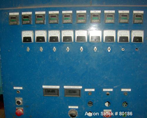 USED: Berlyn 4.5" single screw extruder, model 4.5" extruder. 30:1 L/D6 zone electrically heated, water cooled. 4-1/2" diameter watercooled feed throat. 5" diameter side vent, 94" from feed, 44" cent...