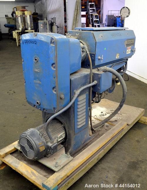 Used Berlyn 1-1/2” Single Screw Extruder. Approximate 30 to 1 L/D ratio. Electrically heated, air cooled 4 zone side vented barrel. Water cooled feed throat, no hopper, approximate 38-1/2” centerline...
