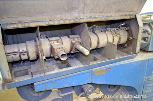 Used Berlyn 1-1/2” Single Screw Extruder. Approximate 30 to 1 L/D ratio. Electrically heated, air cooled 4 zone side vented barrel. Water cooled feed throat, no hopper, approximate 38-1/2” centerline...