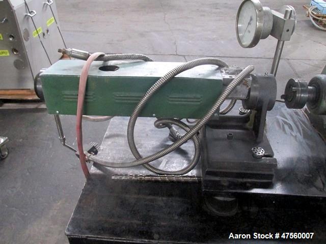 Used Brabender Laboratory Extruder, Type SP-TP250. Electrically heated, water cooled barrel. .75" dia serial 1370Driven by a 3hp DC motor with controller. Includes temperature controllers. Serial# 13...