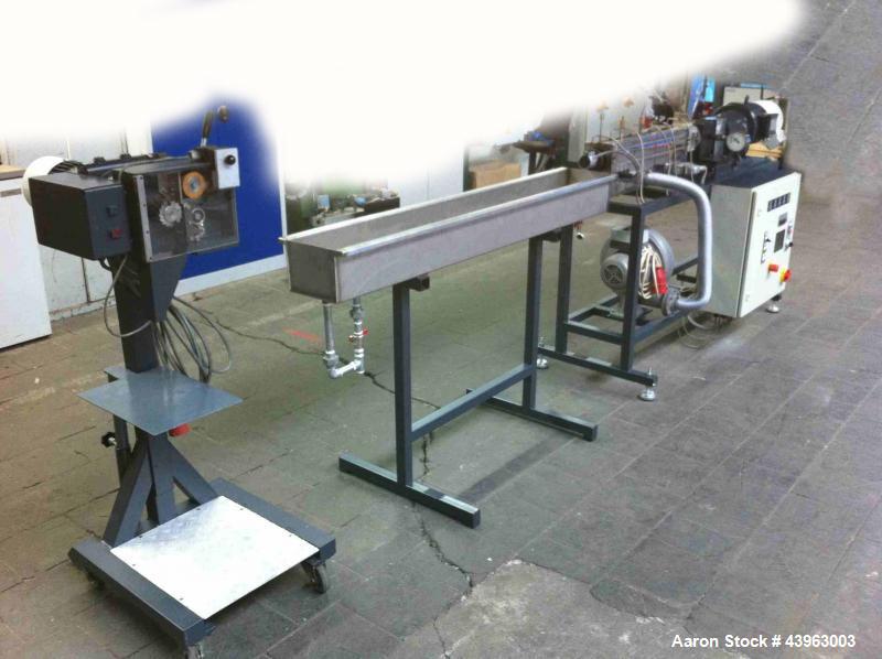 Used Brabender Lab Size Granulation Line comprised of (1) extruder 0.75" (19 mm) diameter, 40 L/D, air cooled and 4 hp/3 kW drive; (1) granulator sG 30; (1) strand die; (1) cooling bath; (1) control ...