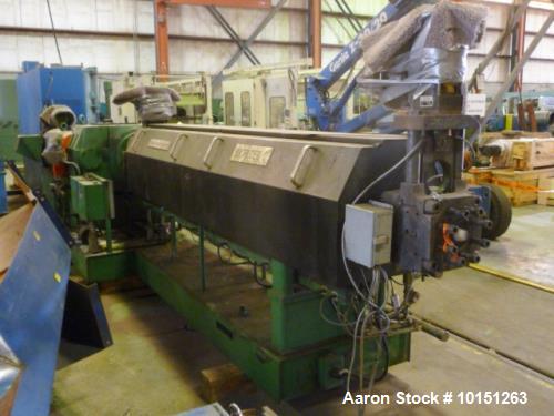 Used 4.50" Brampton 30/1 L/D Extruder. Has 38" center line height. Driven by a 250 hp DC motor with Reliance SCR control. No temperature control panel included. Has Reliance DC motor control, 460 vol...