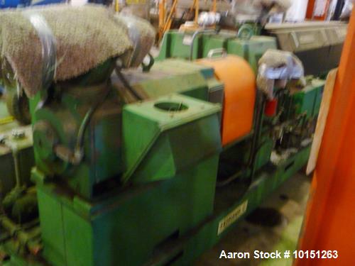 Used 4.50" Brampton 30/1 L/D Extruder. Has 38" center line height. Driven by a 250 hp DC motor with Reliance SCR control. No temperature control panel included. Has Reliance DC motor control, 460 vol...