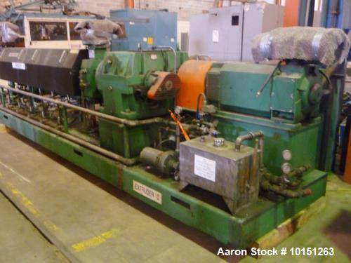Used 4.50" Brampton 30/1 L/D Extruder. Has 38" center line height. Driven by a 250 hp DC motor with Reliance SCR control. No temperature control panel included. Has Reliance DC motor control, 460 vol...