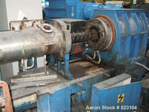 USED: Buss kneader MDKT140. Screw diameter 5.51" (140mm), 11 d,motor 400 kw. 4 oil heaters, 2 crammer feeders, frequency controller,dump extruder ssdl 140-6D, output 1000-1500 kg/h.
