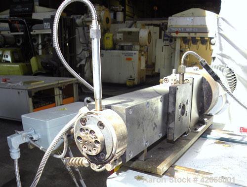 Used Buss Laboratory Ko-Kneader, Model MKS 30-18 / E 40. 30mm Diameter single screw, 18 to 1 L/D ratio. Clam shell type barrel electrically heated, air cooled. Water cooled feed throat with hopper. D...