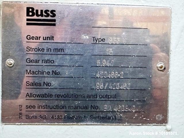 Used 100mm Buss kneader with 9/1 L/D barrel. Driven by 200 hp DC motor, includes 5.94/1 gearbox, jacketed barrel and clam shell barrel opening. Includes operator control panel. Kneader will discharge...
