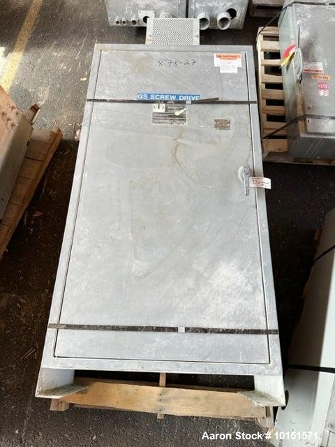 Used 100mm Buss kneader with 9/1 L/D barrel. Driven by 200 hp DC motor, includes 5.94/1 gearbox, jacketed barrel and clam shell barrel opening. Includes operator control panel. Kneader will discharge...