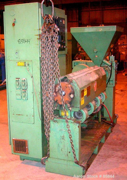 USED: Cincinnati Milicron 2.5" single screw extruder, model Apex, approx 26:1 L/D ratio. Electrically heated, air cooled 4 zone non-vented barrel. Water cooled feed throat with hopper. Approx 41-1/2"...