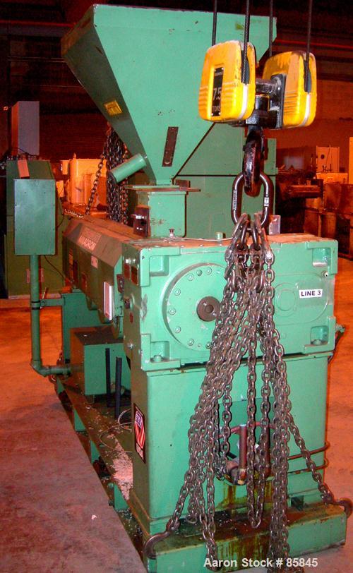 Used Cincinnati Milicron 2.5" Single Screw Extruder, Model Apex, Approximate 26:1 L/D Ratio. Electrically heated, air cooled 4 zone non-vented barrel. Water cooled feed throat with hopper. Approximat...