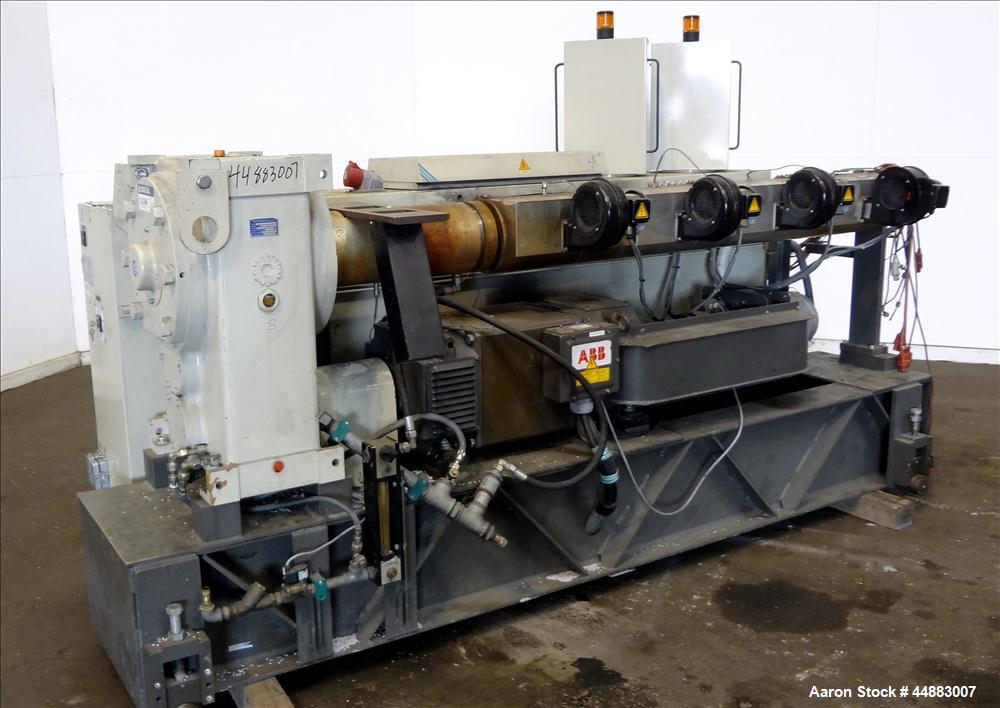 Used Cincinnati Milacron 75mm Single Screw Extruder, Model Proton 70-30G. Approximate 30 to 1 L/D ratio. Electrically heated, air cooled 4 zone non-vented barrel, water cooled feed throat, no hopper....