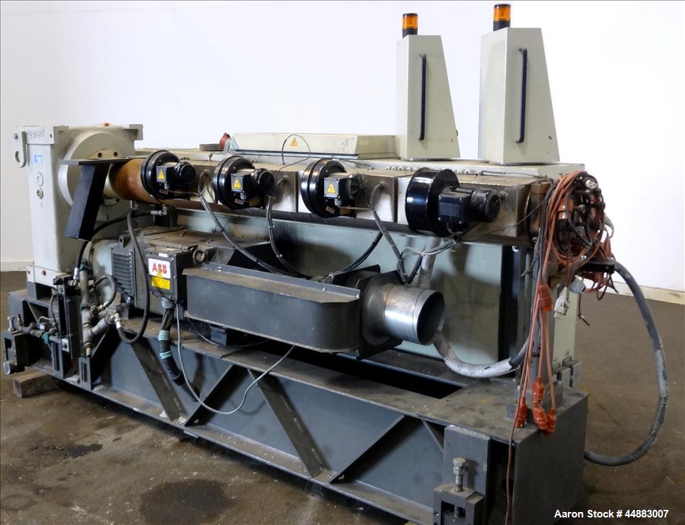 Used Cincinnati Milacron 75mm Single Screw Extruder, Model Proton 70-30G. Approximate 30 to 1 L/D ratio. Electrically heated, air cooled 4 zone non-vented barrel, water cooled feed throat, no hopper....