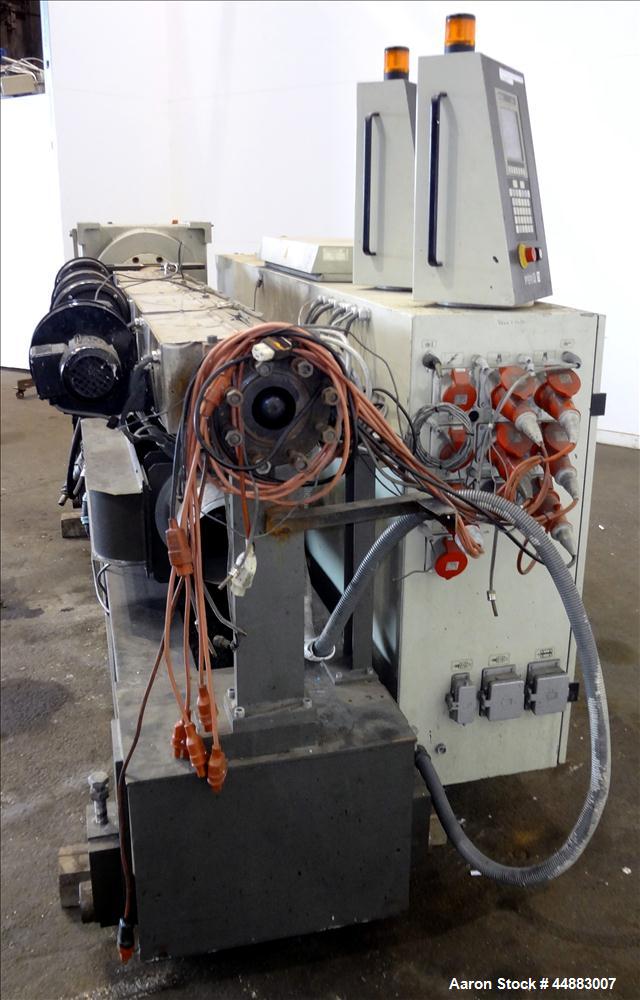 Used Cincinnati Milacron 75mm Single Screw Extruder, Model Proton 70-30G. Approximate 30 to 1 L/D ratio. Electrically heated, air cooled 4 zone non-vented barrel, water cooled feed throat, no hopper....
