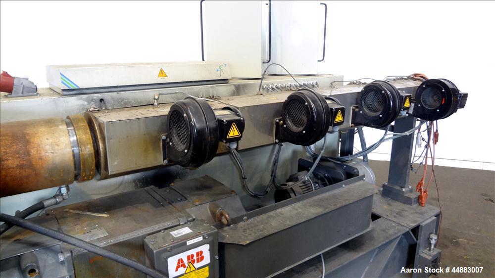 Used Cincinnati Milacron 75mm Single Screw Extruder, Model Proton 70-30G. Approximate 30 to 1 L/D ratio. Electrically heated, air cooled 4 zone non-vented barrel, water cooled feed throat, no hopper....