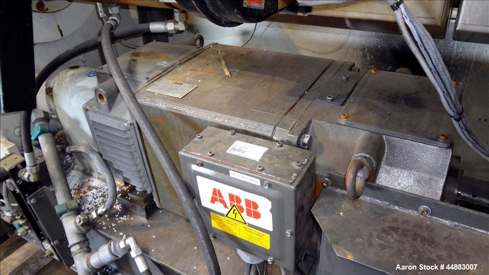 Used Cincinnati Milacron 75mm Single Screw Extruder, Model Proton 70-30G. Approximate 30 to 1 L/D ratio. Electrically heated, air cooled 4 zone non-vented barrel, water cooled feed throat, no hopper....