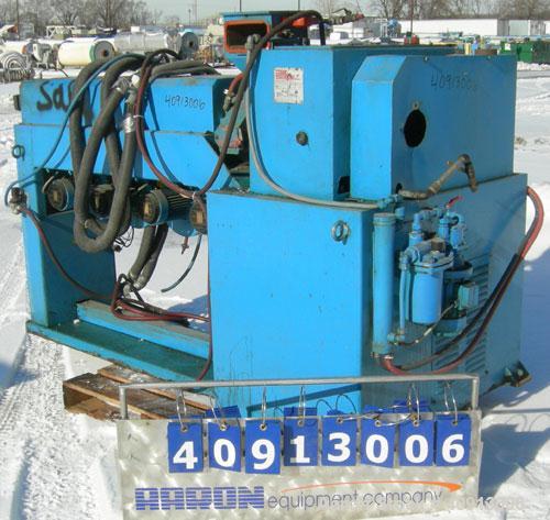 Used Cosmo 2 1/4" Single Screw Extruder. Approximate 26:1 L/D ratio. Electrically heated, air cooled 4 zone non-vented barrel. Water cooled feed throat, no hopper. Driven by a 20 hp, 440 volt, 2810 r...