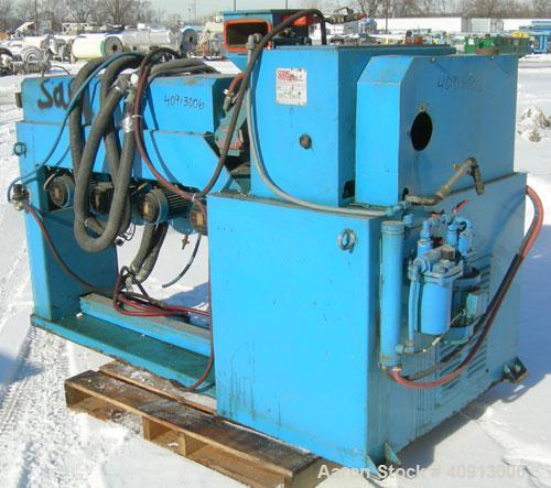 Used Cosmo 2 1/4" Single Screw Extruder. Approximate 26:1 L/D ratio. Electrically heated, air cooled 4 zone non-vented barrel. Water cooled feed throat, no hopper. Driven by a 20 hp, 440 volt, 2810 r...
