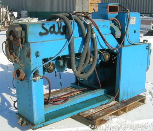 Used Cosmo 2 1/4" Single Screw Extruder. Approximate 26:1 L/D ratio. Electrically heated, air cooled 4 zone non-vented barrel. Water cooled feed throat, no hopper. Driven by a 20 hp, 440 volt, 2810 r...