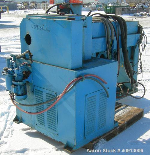 Used Cosmo 2 1/4" Single Screw Extruder. Approximate 26:1 L/D ratio. Electrically heated, air cooled 4 zone non-vented barrel. Water cooled feed throat, no hopper. Driven by a 20 hp, 440 volt, 2810 r...