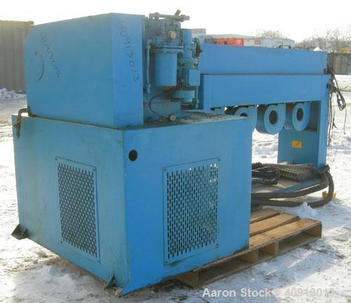 Used Cosmo 2 1/2" Single Screw Extruder, Approximate 30:1 L/D Ratio. Electrically heated, air cooled 4 zone non-vented barrel. Water cooled feed throat, no hopper. Driven by an approximate 20 HP DC m...