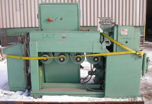 Used Cosmo 2" Single Screw Extruder, Approximate 30:1 L/D Ratio. Electrically heated, air cooled 4 zone non-vented barrel. Water cooled feed throat with magnet, no hopper. Driven by an approximately ...