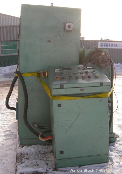 Used Cosmo 2" Single Screw Extruder, Approximate 30:1 L/D Ratio. Electrically heated, air cooled 4 zone non-vented barrel. Water cooled feed throat with magnet, no hopper. Driven by an approximately ...