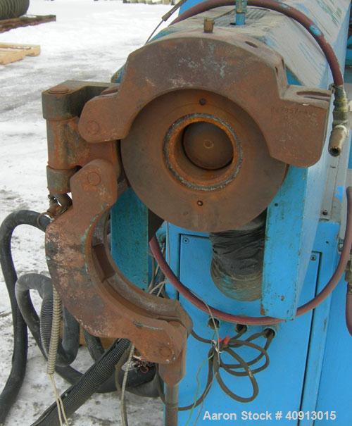 Used Cosmo 2 1/2" Single Screw Extruder. Approximately 30:1 L/D ratio. Electrically heated, air cooled 4 zone non-vented barrel. Water cooled feed throat with magnet, no hopper. Driven by a 4/40 hp, ...