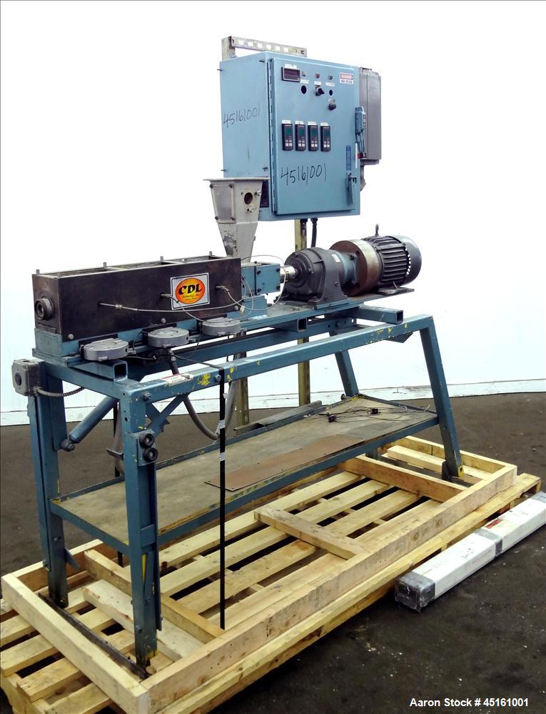 Used Crown / CDL Technology 1" Single Screw Extruder. Approximate 30 to 1 L/D ratio. Electrically heated air cooled 3 zone non-vented barrel. Water cooled feed throat with hopper, approximate 42-1/2"...