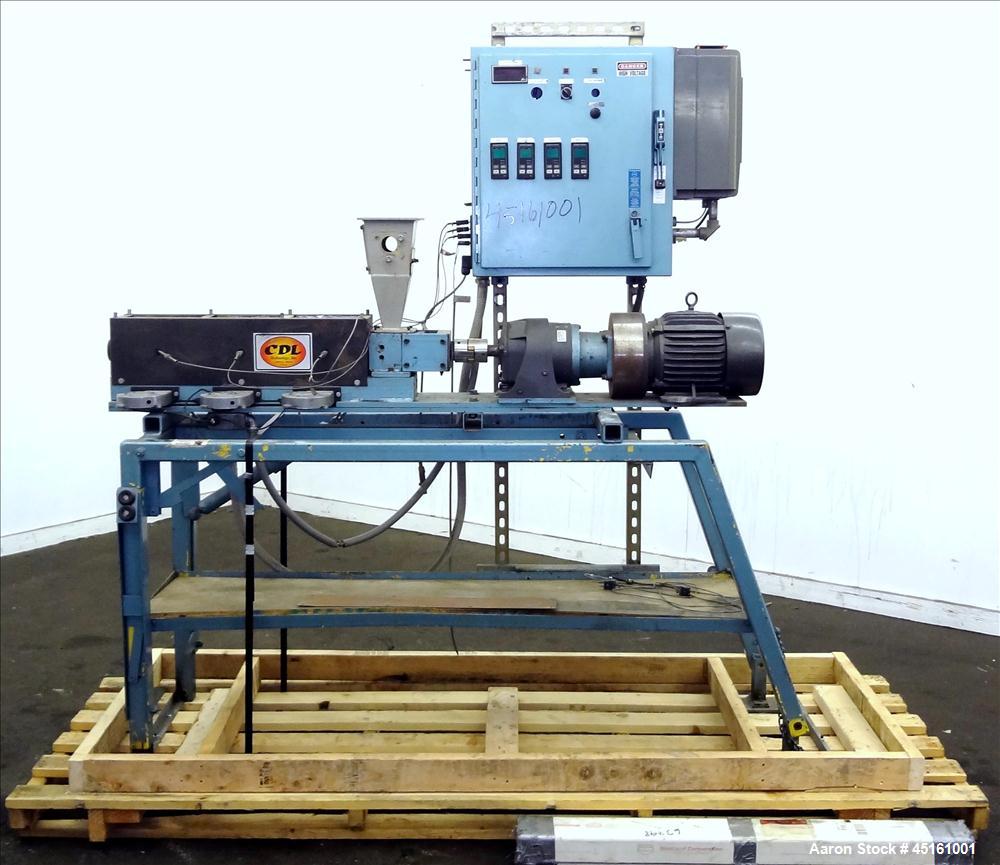 Used Crown / CDL Technology 1" Single Screw Extruder. Approximate 30 to 1 L/D ratio. Electrically heated air cooled 3 zone non-vented barrel. Water cooled feed throat with hopper, approximate 42-1/2"...