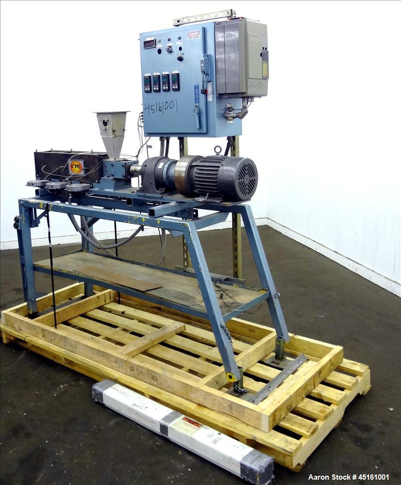 Used Crown / CDL Technology 1" Single Screw Extruder. Approximate 30 to 1 L/D ratio. Electrically heated air cooled 3 zone non-vented barrel. Water cooled feed throat with hopper, approximate 42-1/2"...