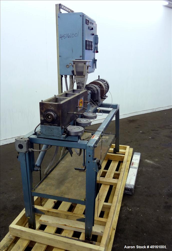 Used Crown / CDL Technology 1" Single Screw Extruder. Approximate 30 to 1 L/D ratio. Electrically heated air cooled 3 zone non-vented barrel. Water cooled feed throat with hopper, approximate 42-1/2"...