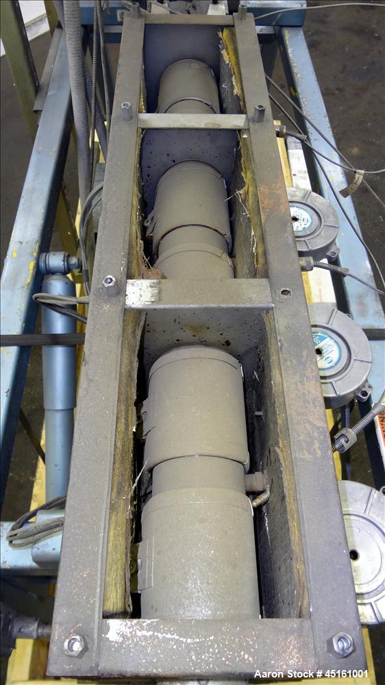 Used Crown / CDL Technology 1" Single Screw Extruder. Approximate 30 to 1 L/D ratio. Electrically heated air cooled 3 zone non-vented barrel. Water cooled feed throat with hopper, approximate 42-1/2"...