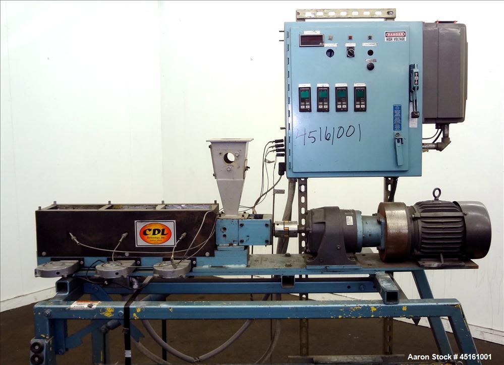 Used Crown / CDL Technology 1" Single Screw Extruder. Approximate 30 to 1 L/D ratio. Electrically heated air cooled 3 zone non-vented barrel. Water cooled feed throat with hopper, approximate 42-1/2"...