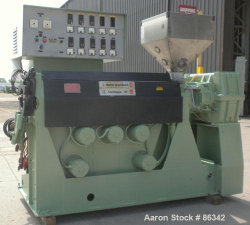 Used Davis Standard 2.5" Single Screw Extruder, Model 250S, Approximate 24:1 L/D ratio. Electrically heated, air cooled 5 zone non-vented barrel. Water cooled feed throat with hopper. Driven by a 40 ...