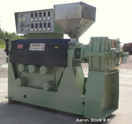 Used Davis Standard 2.5" Single Screw Extruder, Model 250S, Approximate 24:1 L/D ratio. Electrically heated, air cooled 5 zone non-vented barrel. Water cooled feed throat with hopper. Driven by a 40 ...