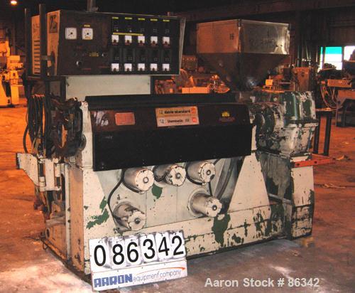 Used Davis Standard 2.5" Single Screw Extruder, Model 250S, Approximate 24:1 L/D ratio. Electrically heated, air cooled 5 zone non-vented barrel. Water cooled feed throat with hopper. Driven by a 40 ...