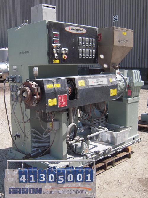Used Davis Standard 2 1/2" Single Screw Extruder, Model 25MK5, Type DSPA. 24 to 1 L/D Ratio. Electrically heated, air cooled 4 zone side-vented barrel with vacuum pump. Water cooled feed throat with ...