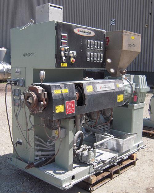 Used Davis Standard 2 1/2" Single Screw Extruder, Model 25MK5, Type DSPA. 24 to 1 L/D Ratio. Electrically heated, air cooled 4 zone side-vented barrel with vacuum pump. Water cooled feed throat with ...