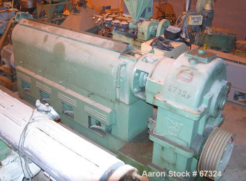 USED: Davis Standard 4.5" single screw extruder, model 45-T. 24:1 L/D ratio, 43" center line, 4 zone electrically heated, air cooled barrel, 4-1/2" x 6" feed throat (no hopper). No motor. Unit includ...