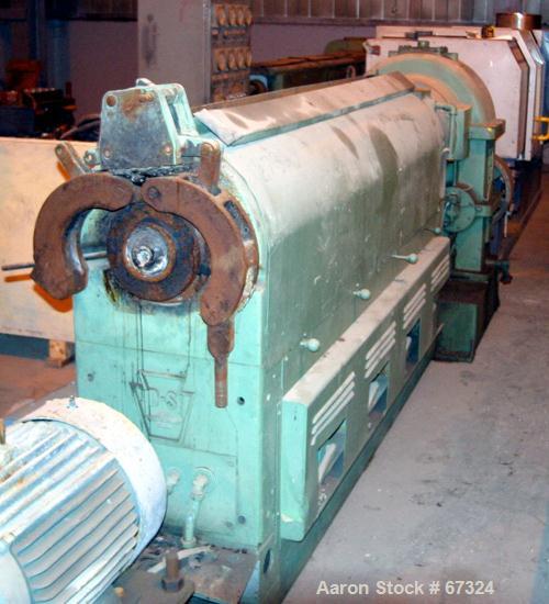 USED: Davis Standard 4.5" single screw extruder, model 45-T. 24:1 L/D ratio, 43" center line, 4 zone electrically heated, air cooled barrel, 4-1/2" x 6" feed throat (no hopper). No motor. Unit includ...